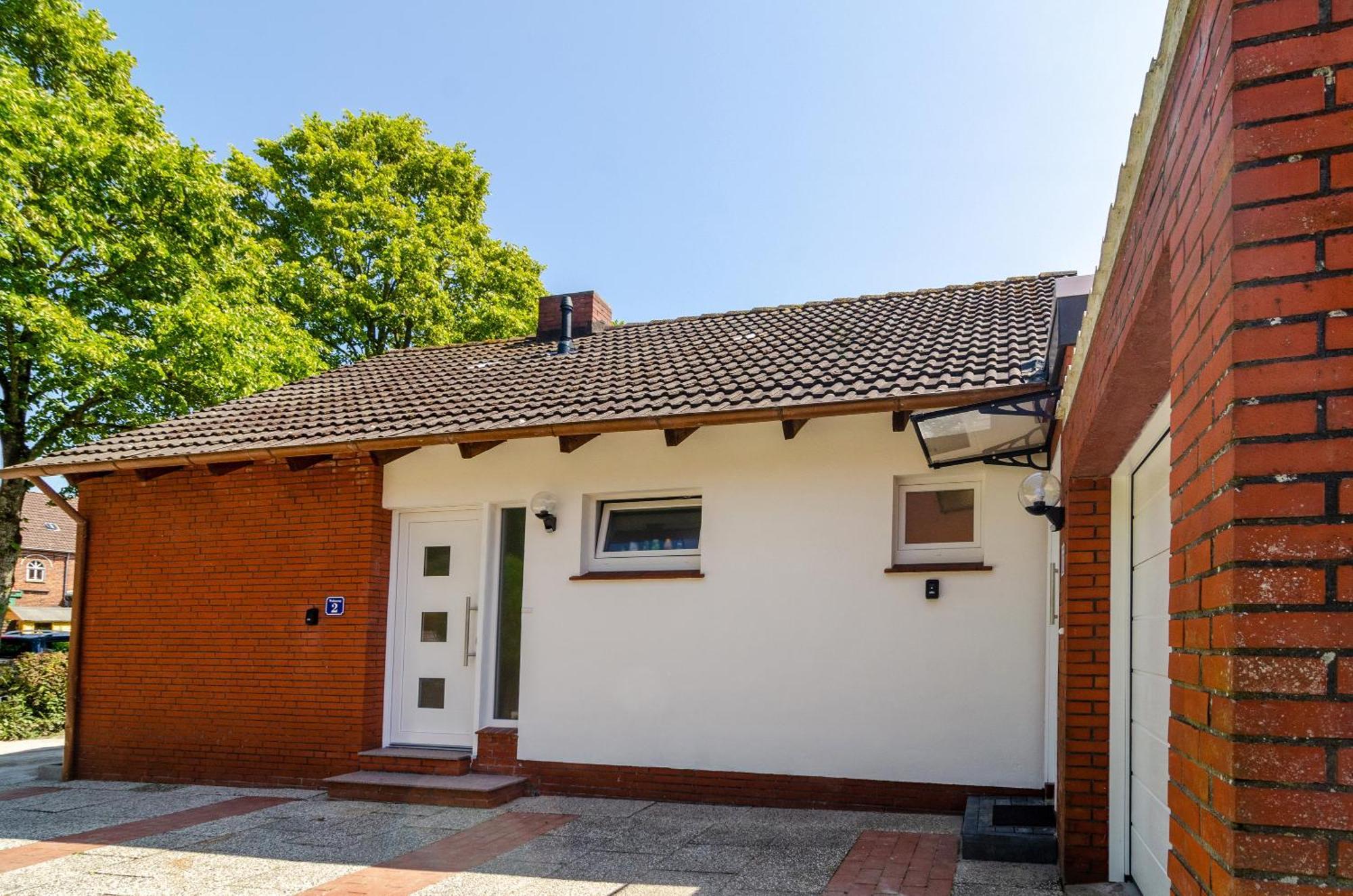 Ferienhaus Sonnenschein - Wohnung 1 Norden Esterno foto